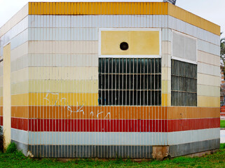 yellow, orange, red, white, ceramic tiled building façade part