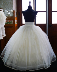 mannequin with white tulle dress