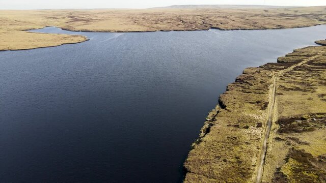 Aerial Drone Fly Over Valley In Stunning Dovestone Reservoir Peak District National Park Greenfield Saddleworth Moor Manchester