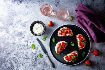 Strawberry ricotta sandwiches with mint leaves