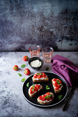 Strawberry ricotta sandwiches with mint leaves