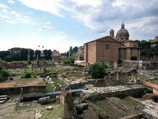 Fototapeta na wymiar Roman Forum view of Tempio della Pace and Fori Imperiali from streets of Rome, Italy