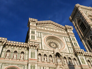 Cathedral of Santa Maria del Fiore. Landmark 1200s cathedral colored marble facade and Giotto tower...