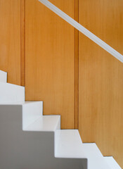 stair profile and wood paneled wall