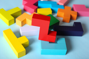 Multicolored puzzle, cubes on a blue background