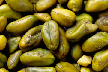 Close up of green pistachios. Top view.