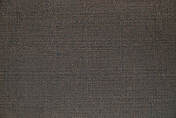 Fototapeta premium Background: rough brown fabric with blank space for lettering