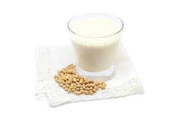 Soy milk with beans on napkin. Vegan drink, concept photo.