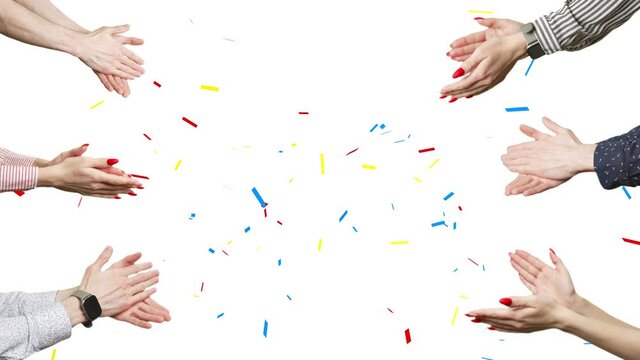 A hands are clapping at white background. A hands are applauding with a confetti in flight. Concept of victory and award. Copy text space. Concept of subscrabers or followers