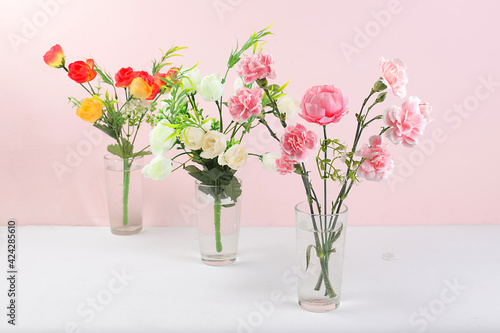 Holiday concept with flowers, spring or summer composition, still life, flowers in a vase, banner. Mother's day card, happy birthday, wedding, flower shop advertisement, selective focus,