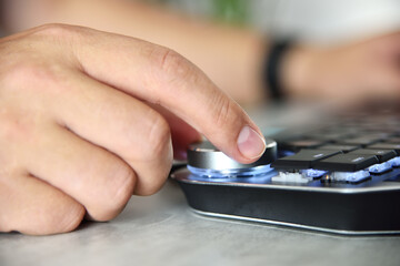 Designer using wheel manipulator