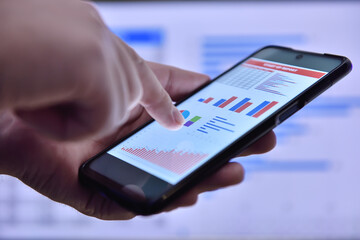 Close up of trader checks business report