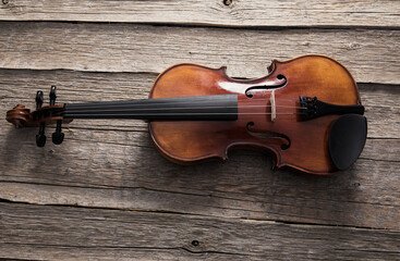 Fototapeta na wymiar classical violin on wooden table