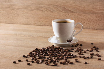 white cup of coffee, coffee beans