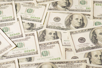 Above photo of pile american dollars cash money earnings isolated