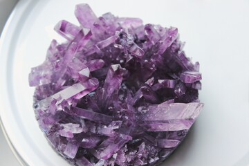 purple crystal on a white background