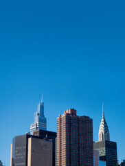Fototapeta na wymiar Blue sky with new york city buildings and sky skyscrapers