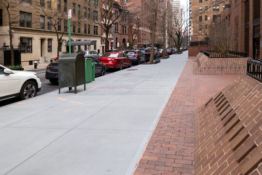 Manhattan New York City concert  sidewalk walkway path with parked streetcars