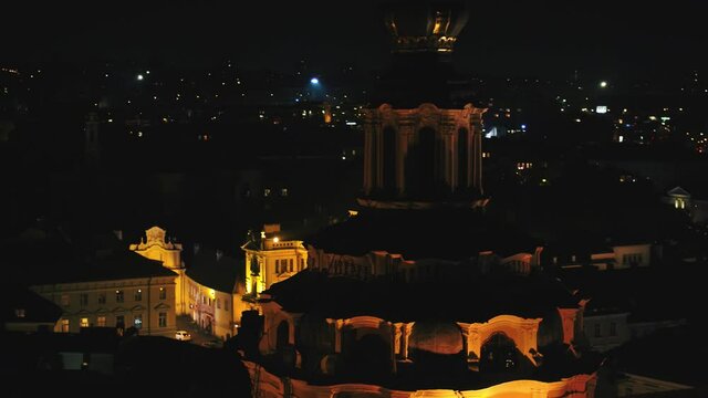Aerial footage of Vilnius Old Town at night. Beautiful scenery of cityscape