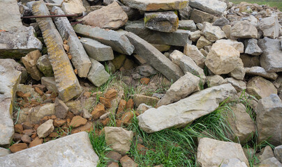 Dump of stones, as a result of the destruction of an antique, Tuscan house 