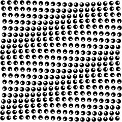 Fototapeta na wymiar Esferas en blanco y negro creando un efecto de movimiento