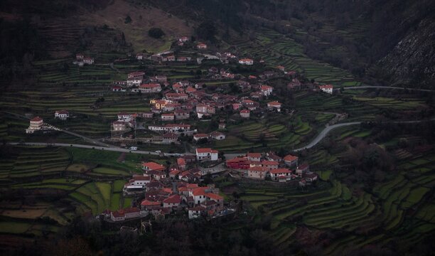 Aerial panorama view of green agriculture farming terraces in remote rural mountain village town Sistelo Norte Portugal