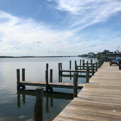 Fototapeta premium On a dock along the Intercostal Waterway in northern Florida near New Smyrna Beach