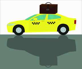 Fototapeta premium A yellow taxi with a suitcase on the roof. Business concept.