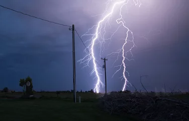 Fotobehang Thunder and lightning storm close strike Yakima Indian reservation © heidi