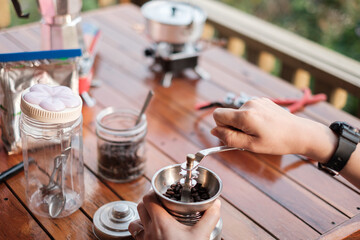 Travel, camping and dripping coffee in the mountains of northern Thailand in the morning with beautiful views.
