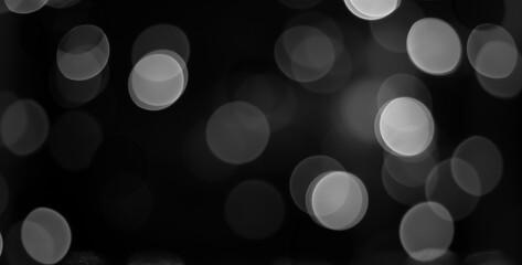 abstract light effect bokeh background on black and white.
