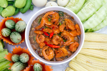 Close up, Chilli paste top of shrimp and mix vegetables.