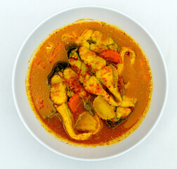 Southern Thai Spicy Sour Yellow Curry with Sea Bass.