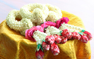 Beautiful hand-made garlands of beautiful jasmine and red roses.