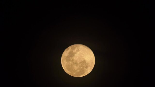 Full moon rise with clear sky.