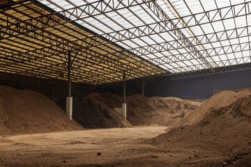 Storing compost and composted soil at warehouse.Recycle industry and environment fertilizer.
