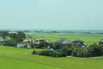 Fototapeta na wymiar Rural Countryside Japanese Town and Crop Fields