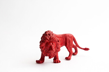 Red lion figure isolated on a white background. Protect wild animals poster.