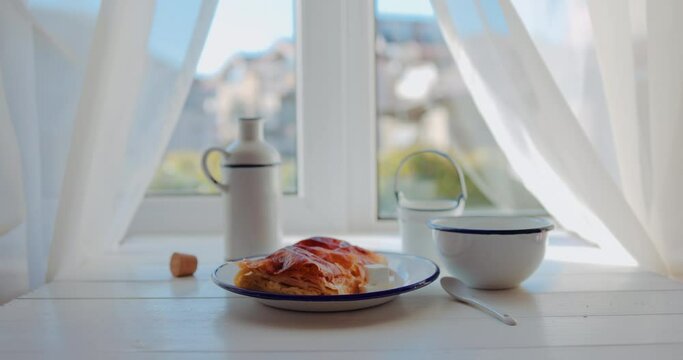 Morning breakfast with freshly baked puffed cheese pie and yogurt milk, 4k video