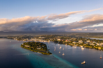 Aerial view of the sunset over the Port Vila bay and the Iririki resort island in Port Vila,...