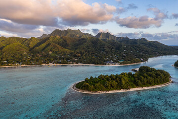 Aerial view of the sunrise over the stunning Muri lagoon and beach in Rarotonga island in the Cook islands, south Pacific