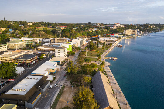 Aerial view of the sunset over the Port Vila seafront, Vanuatu capital city in the south Pacific with the parliament building in the background