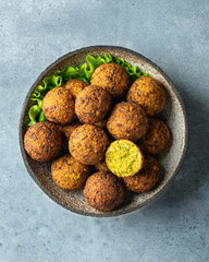 falafel on a blue background, view from above, selective focus