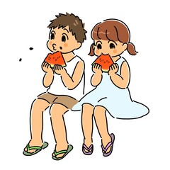 スイカを食べる男の子と女の子
