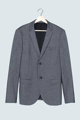 Gray blazer on hanger casual men&rsquo's fashion wear