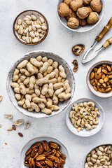 Nuts in cups flat lay healthy food