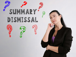 Business concept meaning SUMMARY DISMISSAL question marks with inscription on the wall