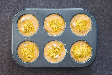 vegan savoury muffins with olives and nutritional yeast before getting baked, healthy plant-based food