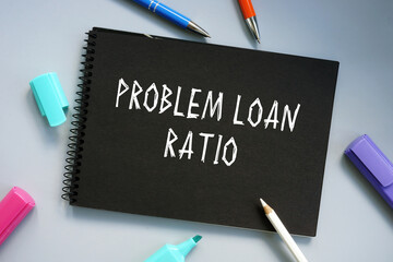 Financial concept meaning Problem Loan Ratio with inscription on the piece of paper.