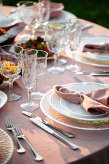 Served outdoor banquet table with assorted oriental appetizers